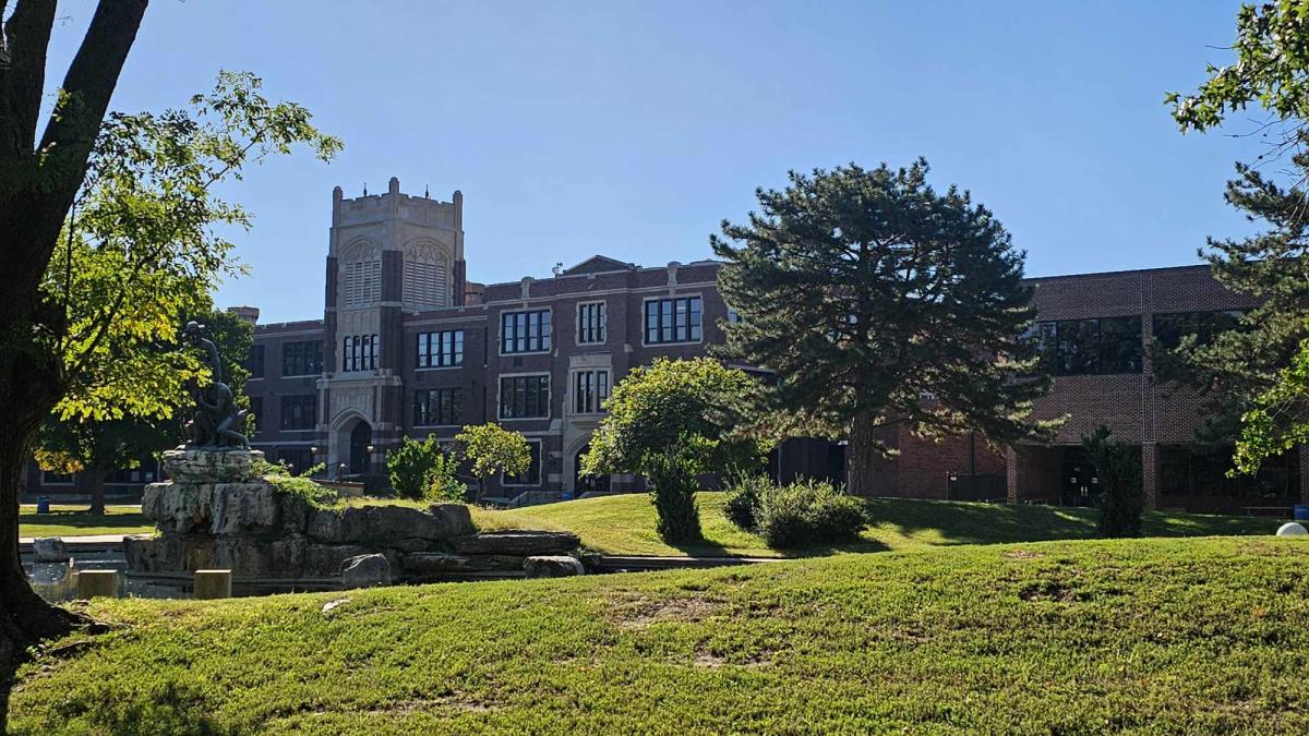 The exterior of Wichita's East High School is photographed on a sunny morning