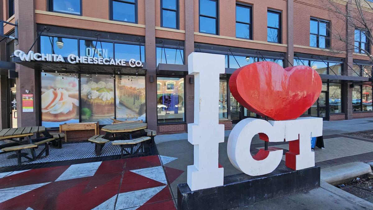 the exterior of the Wichita Cheesecake Co features an I heart ICT sign