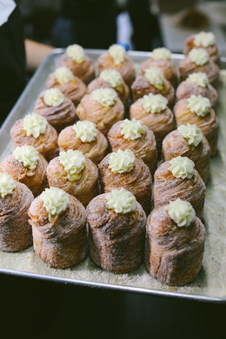 A tray of cruffins lined up and ready for purchase