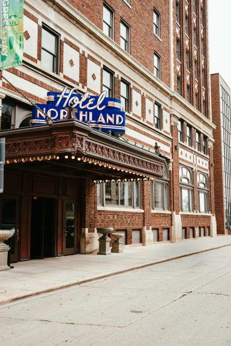 Exterior of Hotel Northland and the large signage in Green Bay, WI.