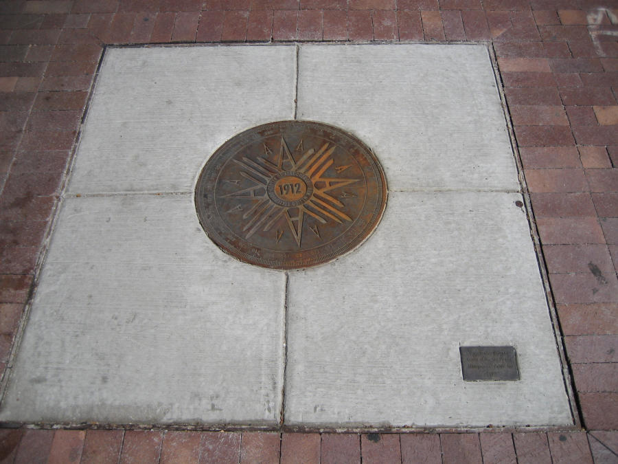 Center of the City Centennial Project showing a decorative manhole cover