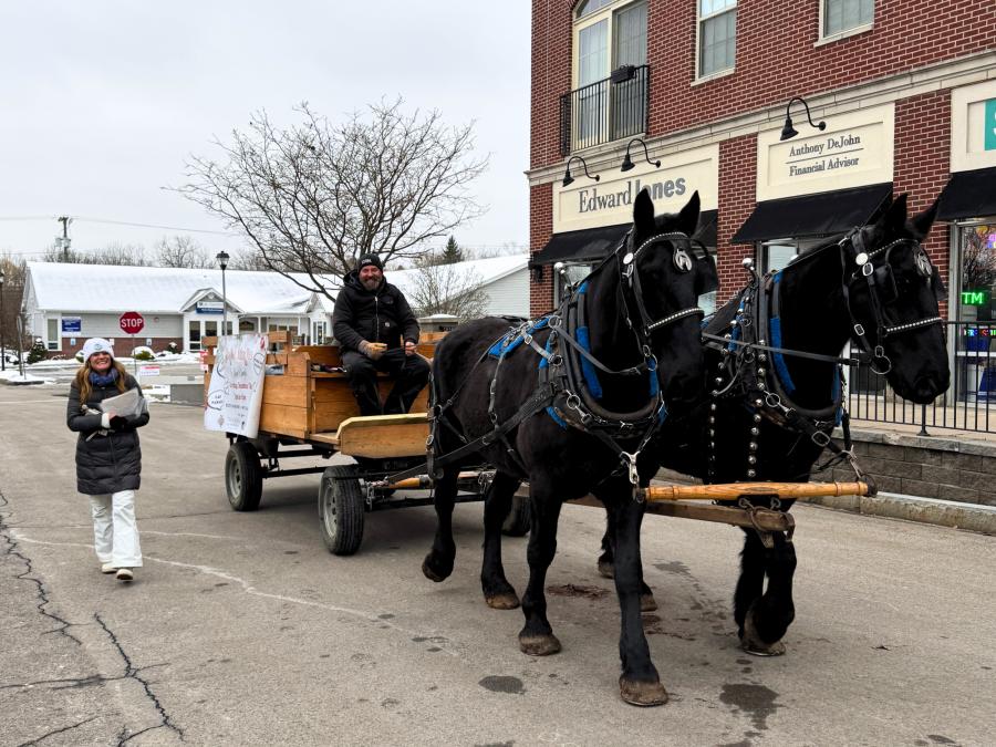 Horses pull a wagon in Victor Jingle Mingle