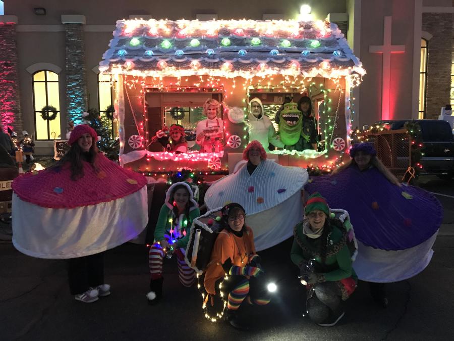 People enjoy a holiday light parade in Longmont