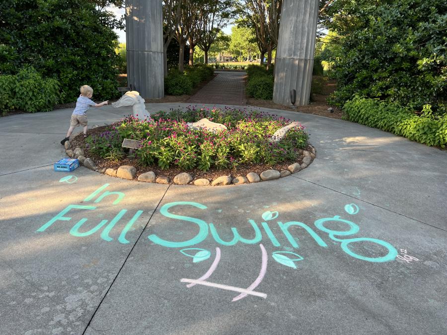 Child Running At In Full Swing At Huntsville Botanical Garden