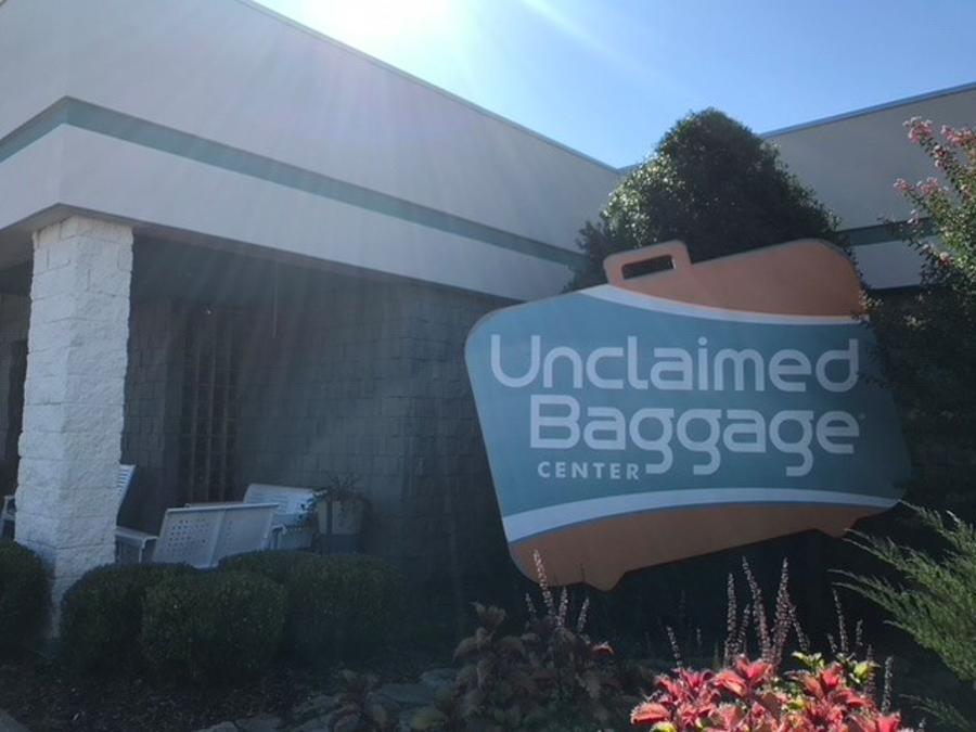 A sign welcomes guests to the main entrance of the Unclaimed Baggage Center in Scottsboro.