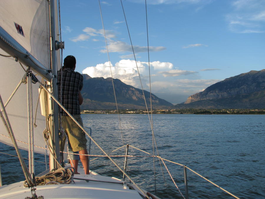 man on sail boat on Utah Lake