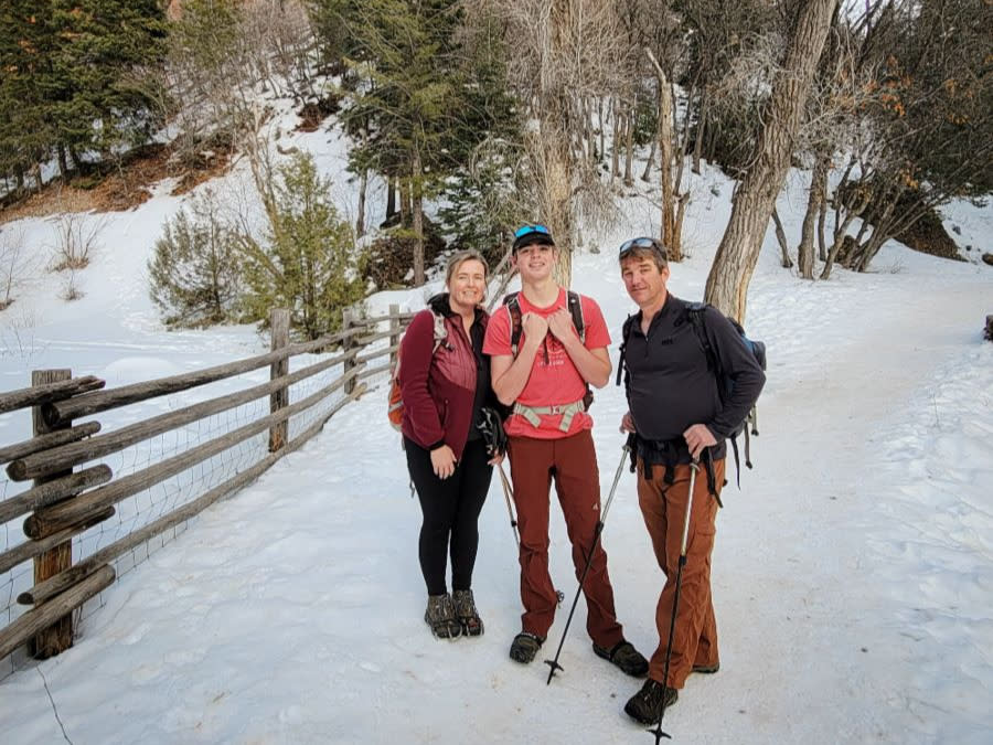 Mom and Dad and son on trail to Fifth Water Hot Springs