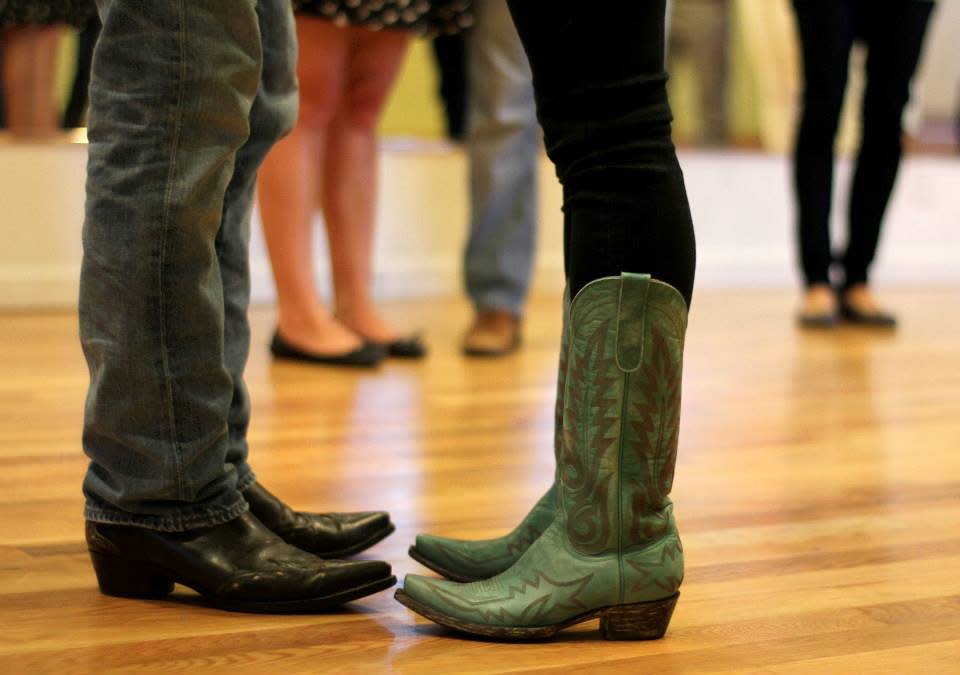 Man And Woman In Cowboy Boots At Glide Studios In Lafayette, LA