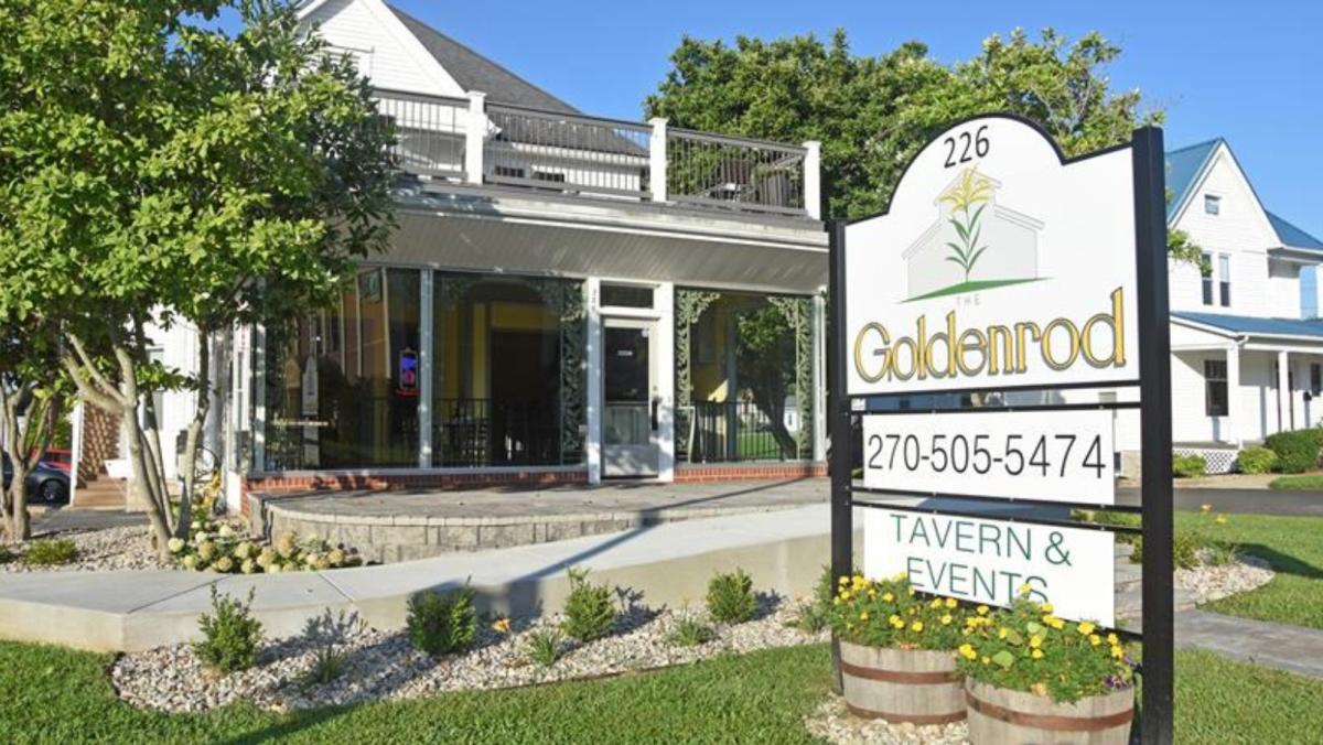 outside goldenrod tavern, shows sign and building