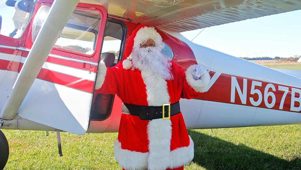 Santa with his Cessna 180.