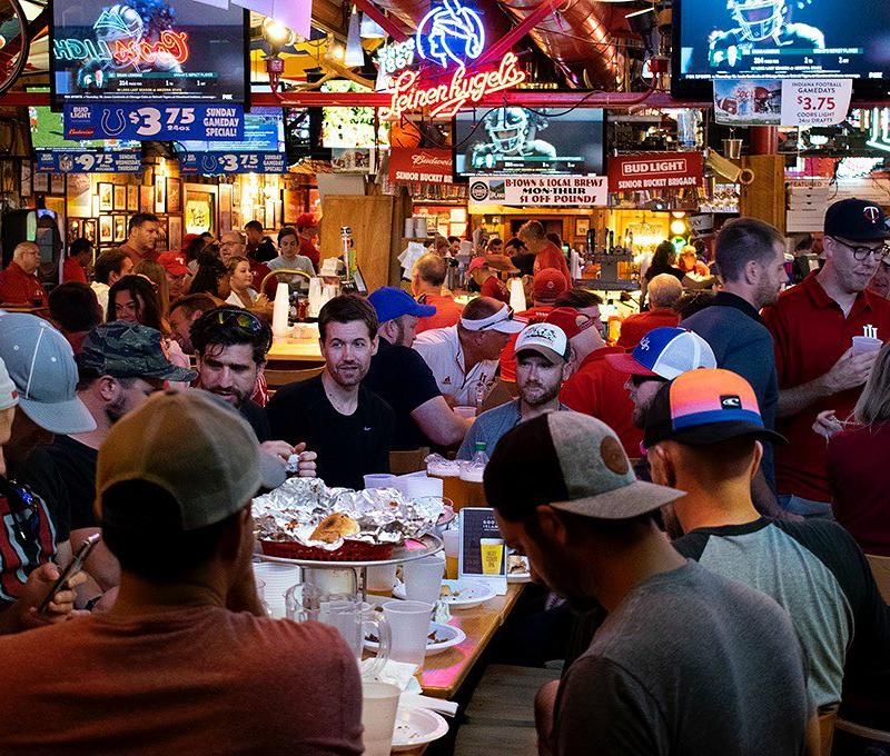 A packed bar room at Nick's English Hut