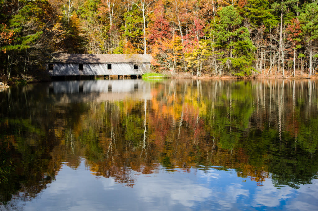 covered-bridge-fall-leaves-Green-Mountain-Madison-County-Nature-Trail-pond-1024x681