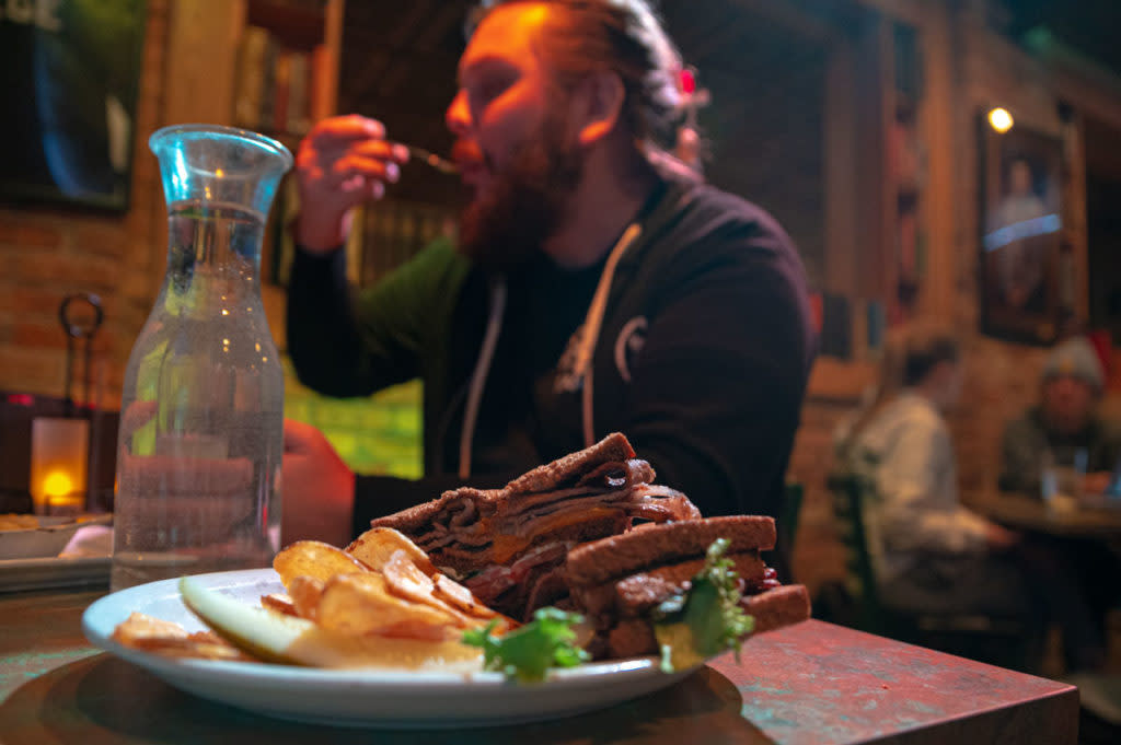 A man enjoying a meal at the Library