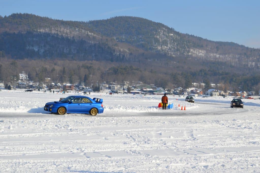 Car races on Lake George during Lake George Winter Carnival