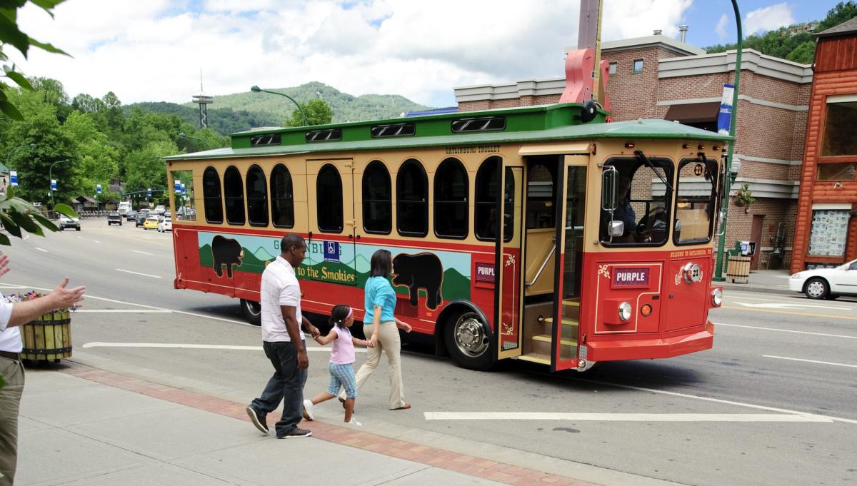 People Walking Toward Trolley