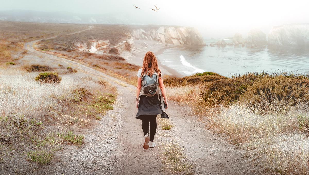 girl hiking a coastal trail in Montana de Oro state park