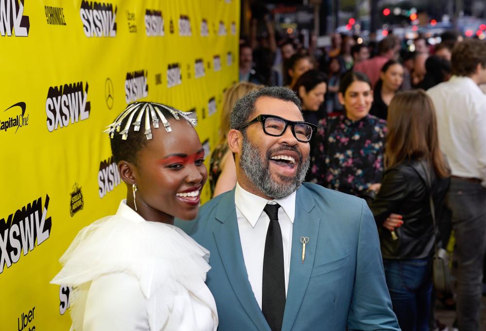 Lupita Nyongo and Jordan Peele on red carpet for SXSW Film Festival 2019