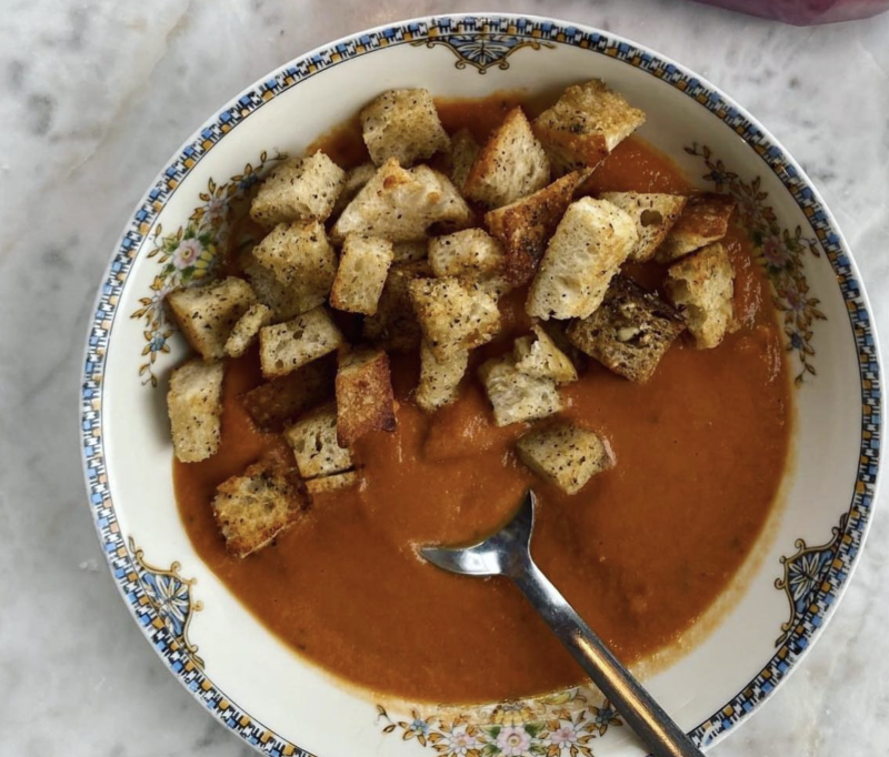Bowl of tomato soup with croutons