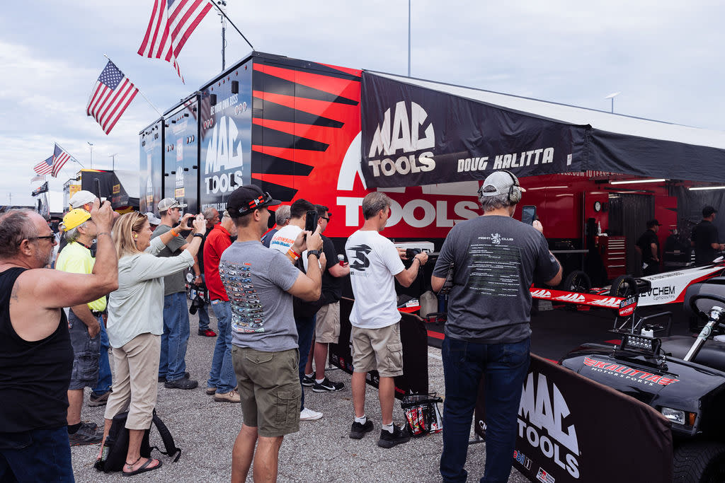 Fans at the NHRA U.S. Nationals get access to the pits.