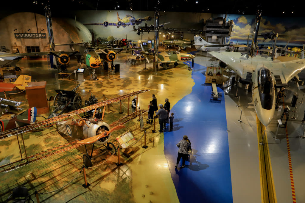 People looking at exhibits at Air Zoo