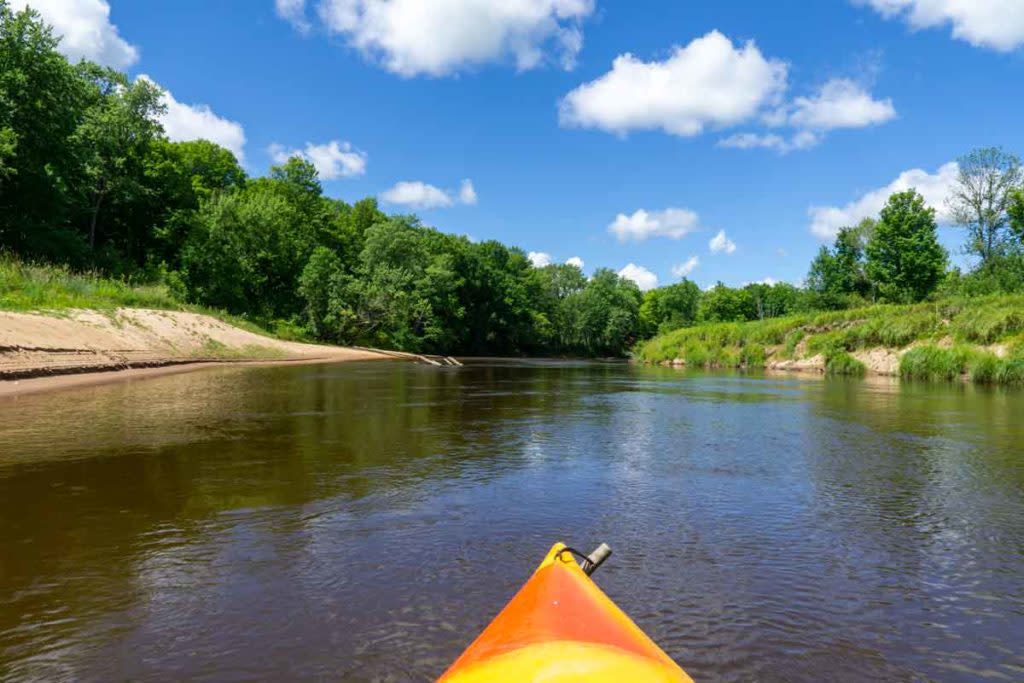 Canoe floating down Sturgeon River