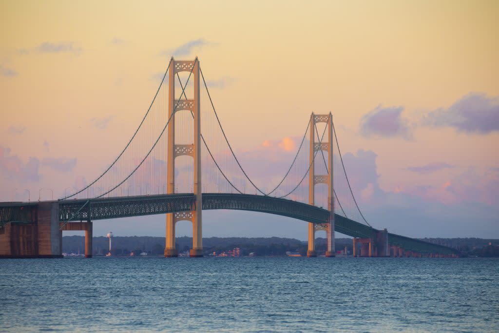 Sunrise paints glorious color on the Mackinac Bridge between Michigan’s Upper and Lower peninsulas near Mackinac Island