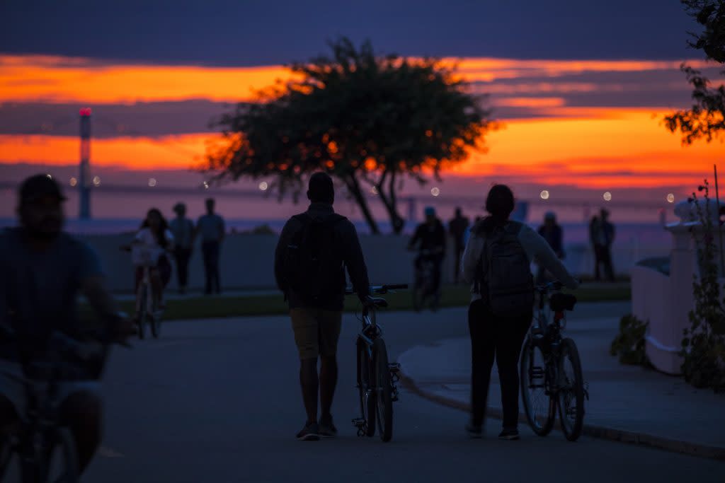Enjoying the beauty of Mackinac Island sunsets and sunrises is one of many reasons to stay overnight during your visit.