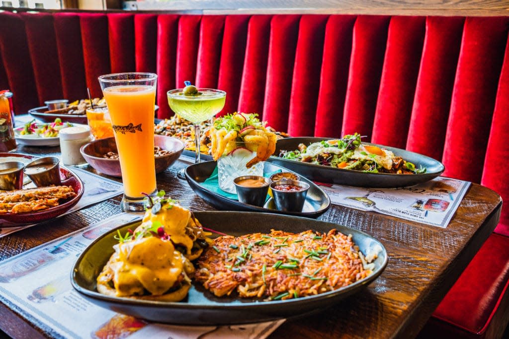 Brunch food and drink items on a table at Buckatabon in Wauwatosa
