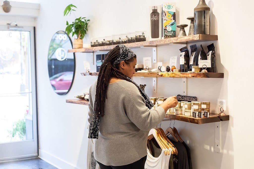 Woman Browsing Products At Lucid Living In Richmond, VA