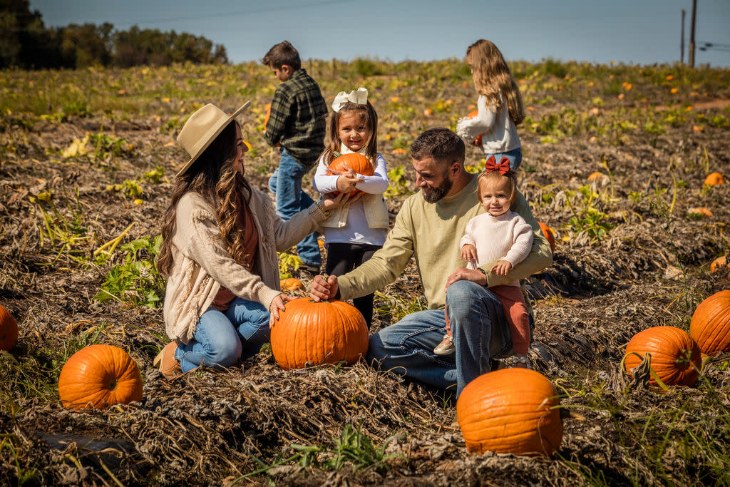 Family Choosing Pumpkins at Patterson
