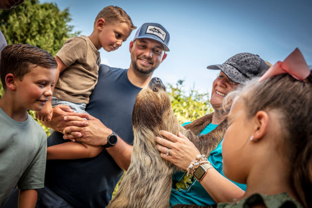 Family with a sloth