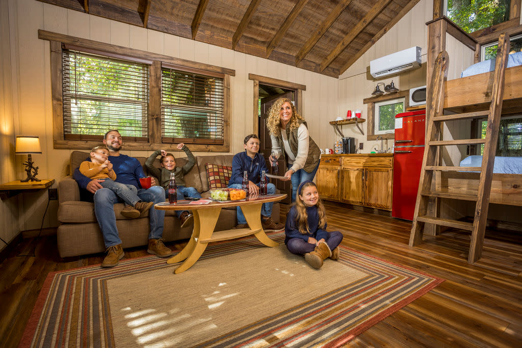 Family inside a treehouse rental