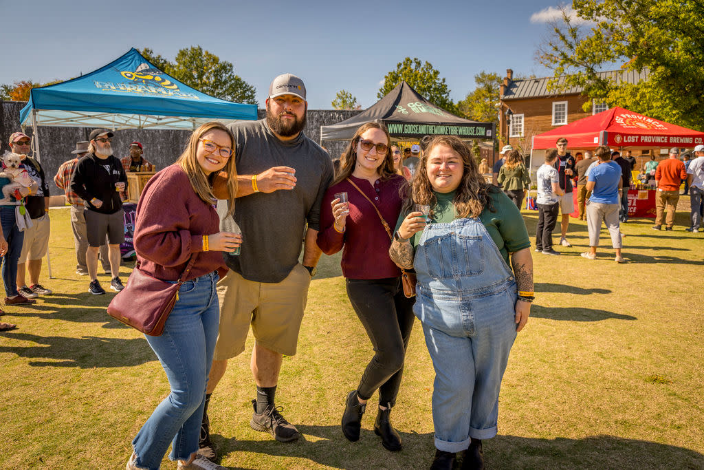 Group of four friends at beer festival