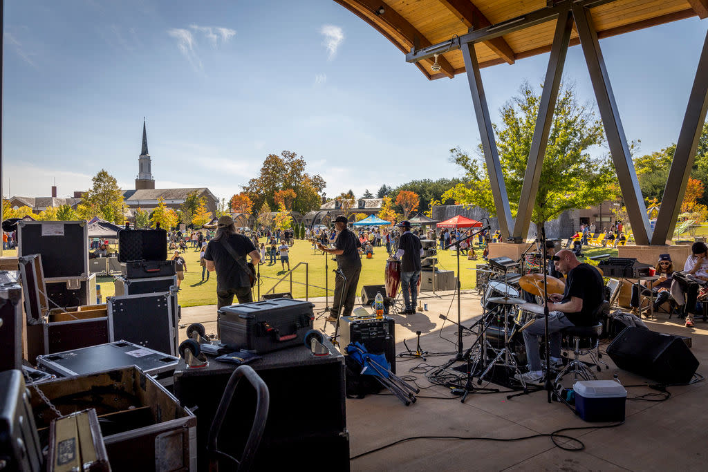 Band performing on stage at outdoor ampitheatre