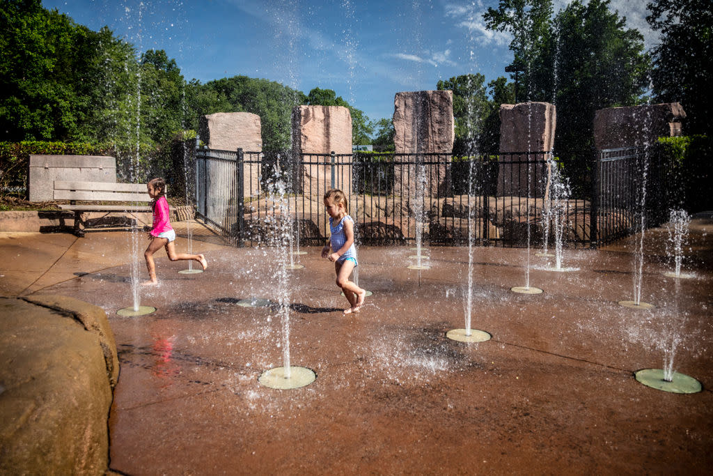 Kids at splash pad at Dan Nicholas Park