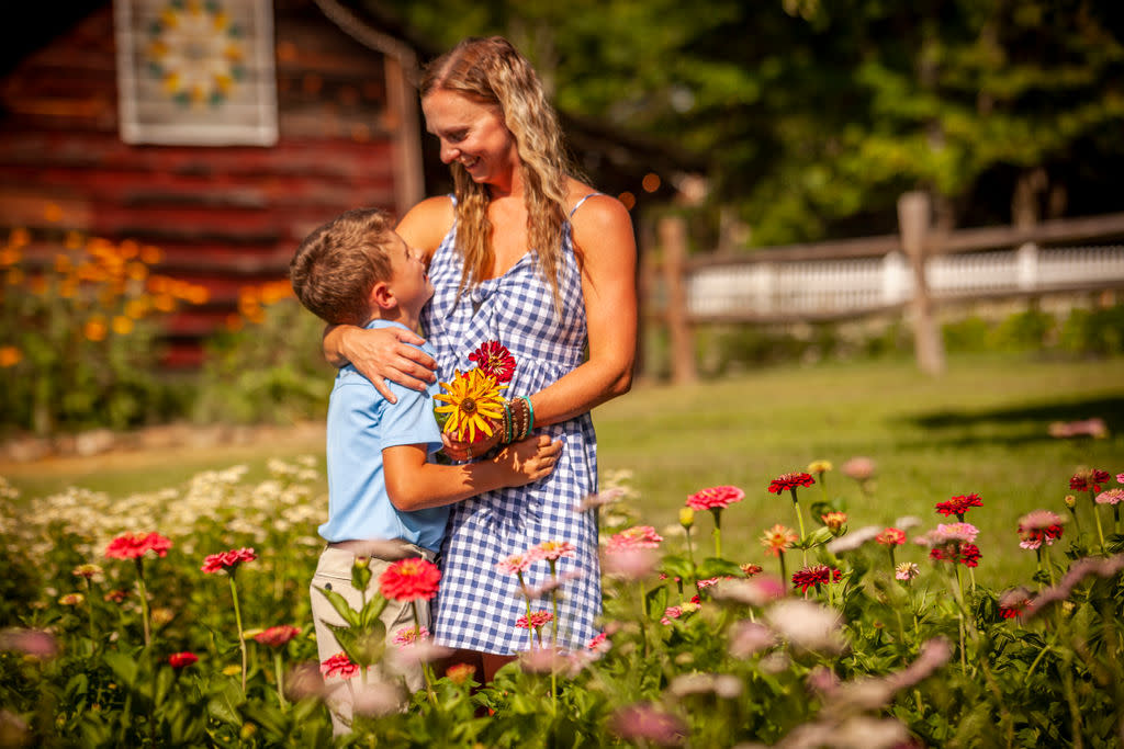 Mom and son in flower field