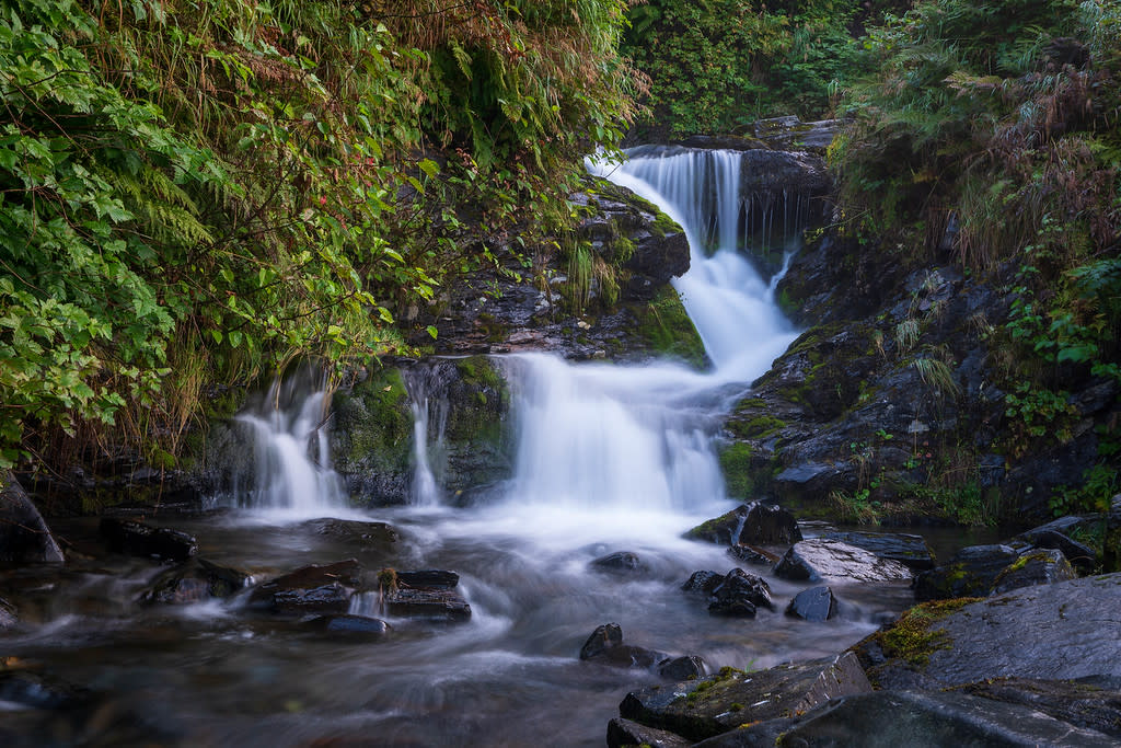 a small waterfall over rocks