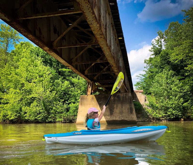 young girl in a kayak