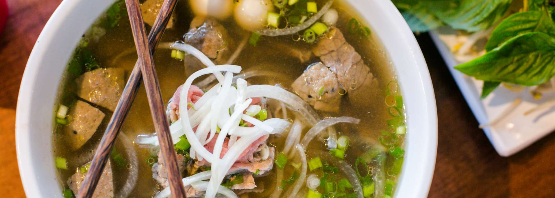 https://assets.simpleviewinc.com/simpleview/image/upload/c_fill,h_686,q_60,w_1920/v1/clients/neworleans/lillys_cafe_vietnamese_pho_72ad279f-40a9-4db0-af9b-bf9994c10eef.jpg