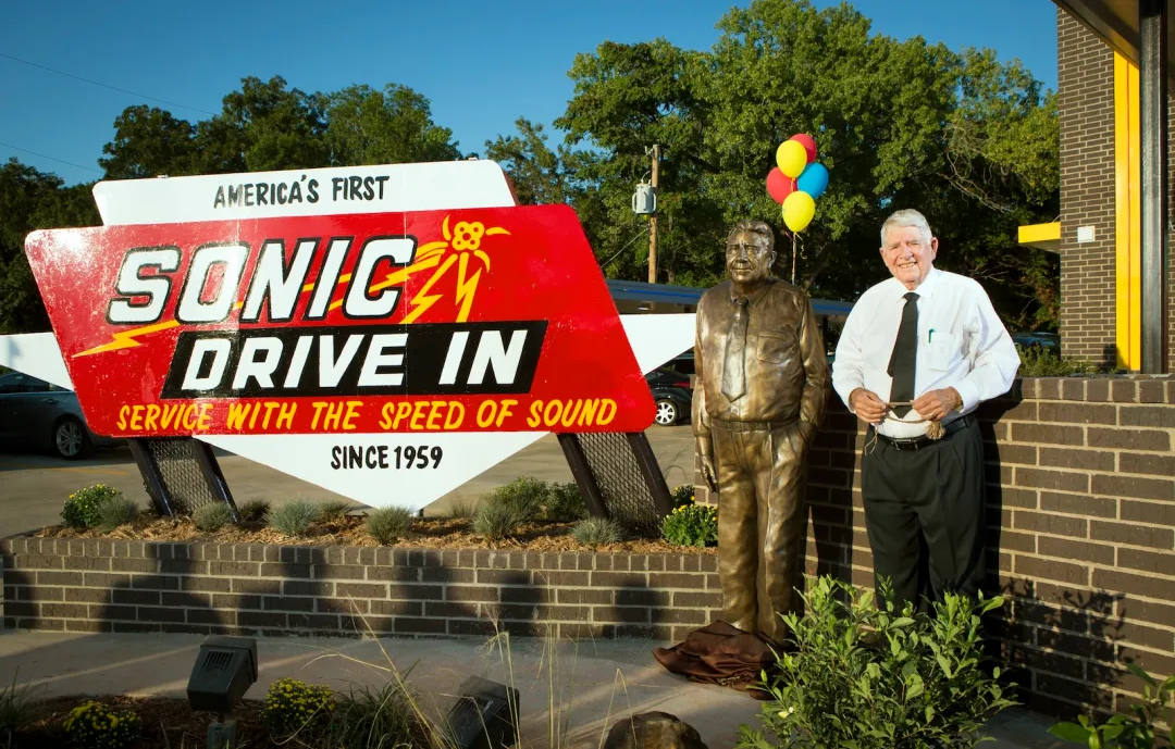 First Sonic Manager Gene Longworth with Statue & Sign