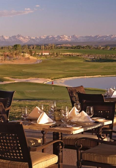 Patio dining area at Remington's at the Bridges overlooking the Bridges Golf Course and the San Juan Mountains in the spring.