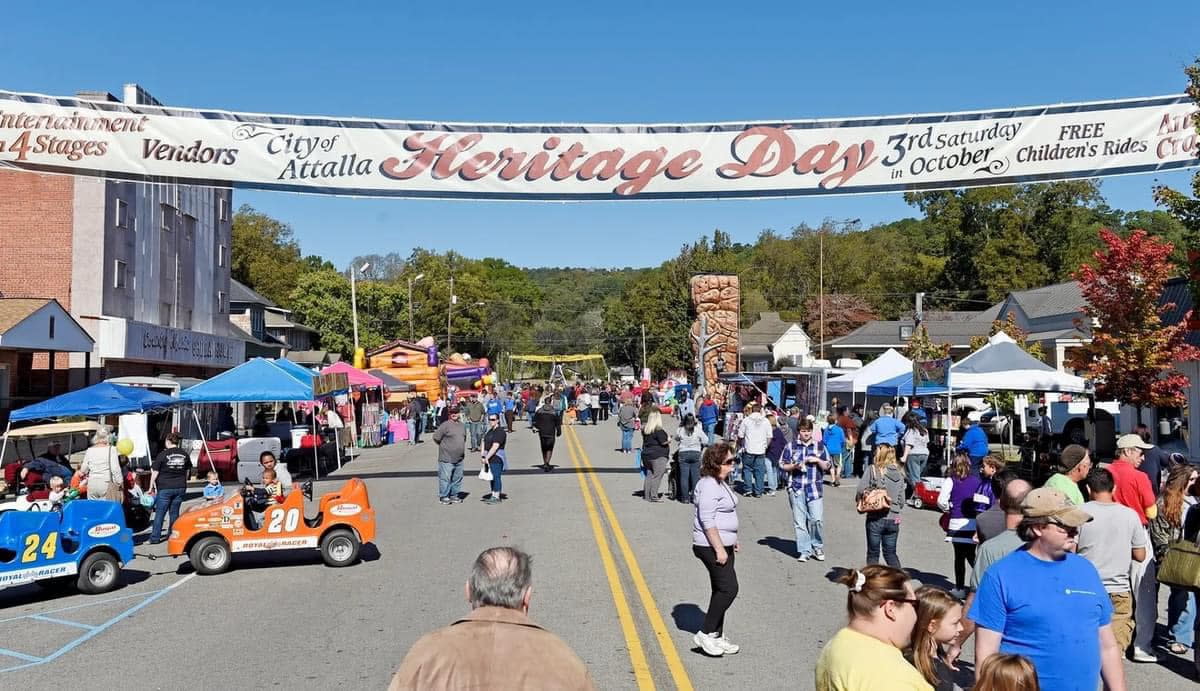 People and arts and craft booths fill the streets of downtown Attalla during annual Heritage Day