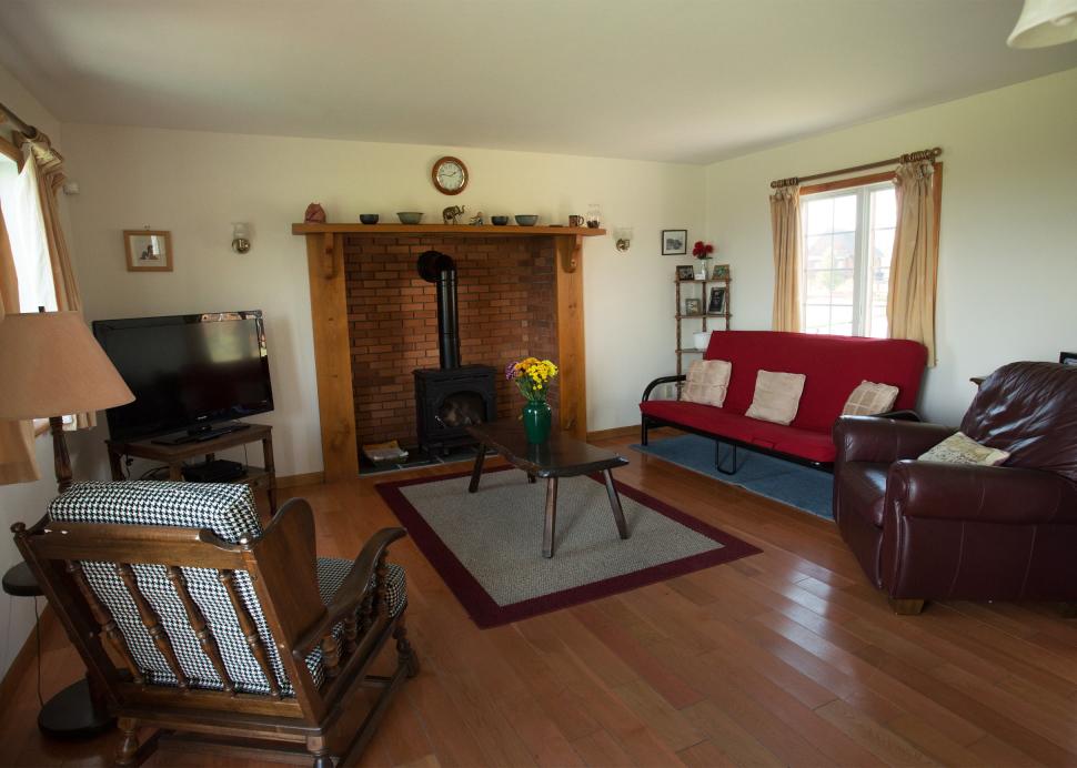 The living room inside of the Cayuga Cottage