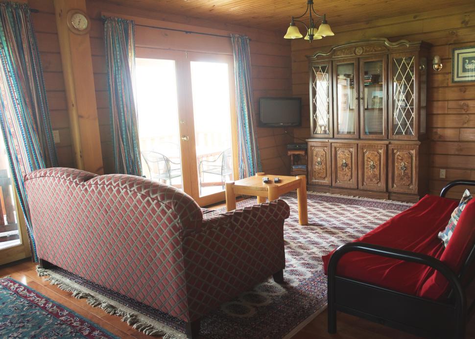 The living room inside of the Conesus Cabin