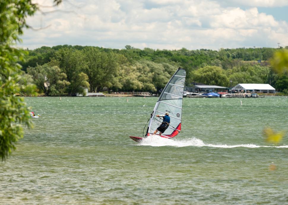 Person windsurfing on Canandaigua Lake