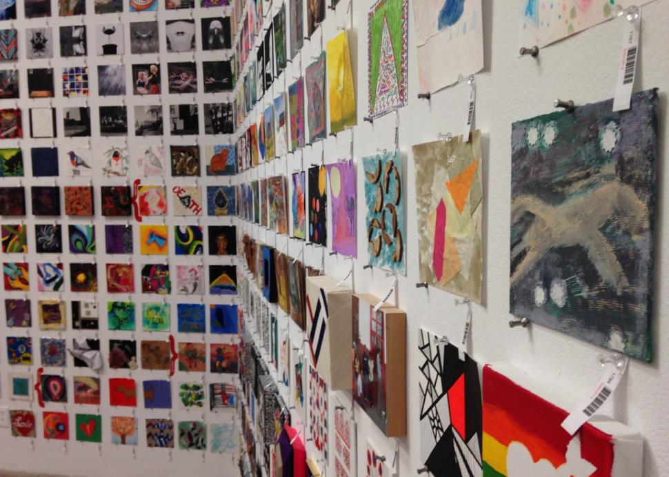 Walls of art from all over the world for the annual 6x6 show