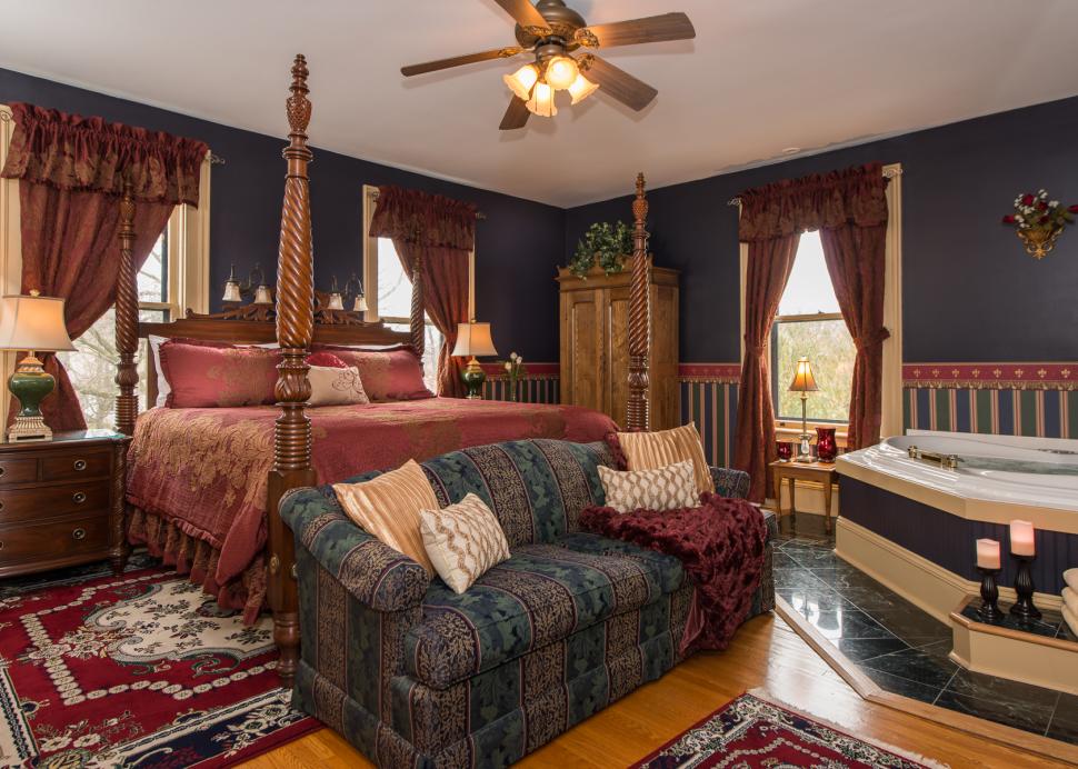 A Photo Of The Inside Of The Gifford Room with King Bed and Corner Jacuzzi