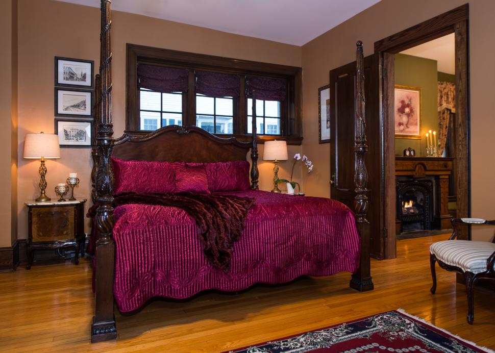 Photo of the bed inside the Penfield Suite at the Inn On The Main