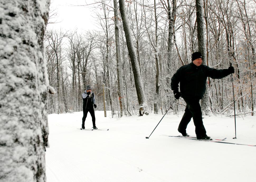 Two men enjoy a day of cross country skiing at Bristol Mountain