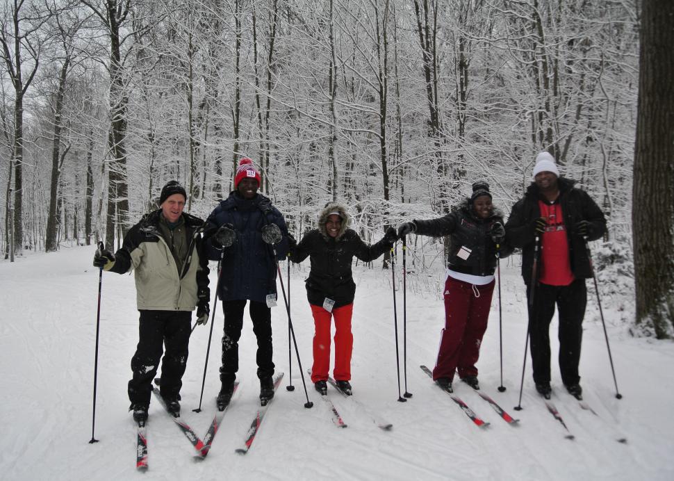 Group shot of nordic skiiers on the trail
